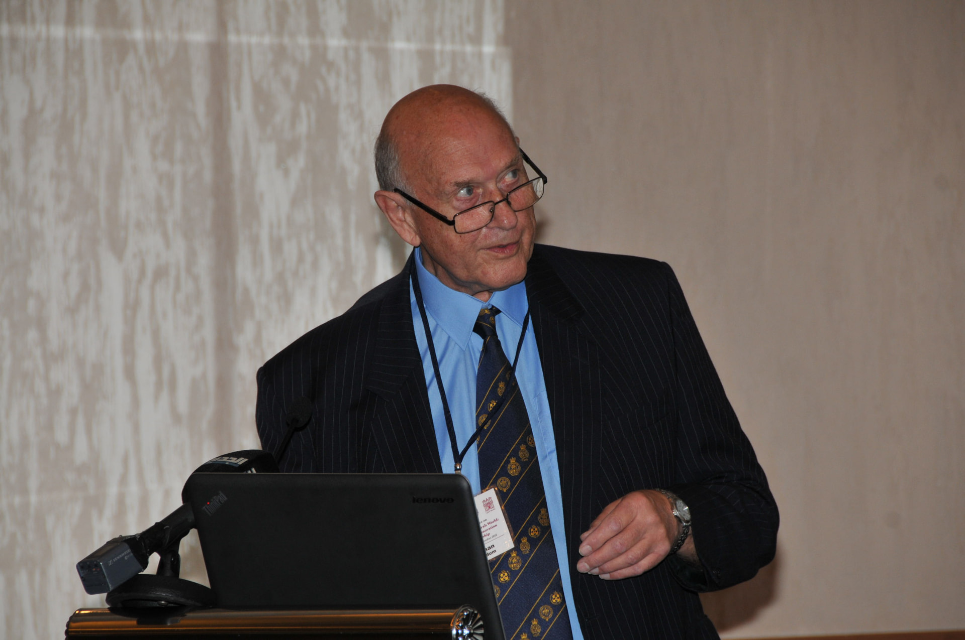 Speaker at the conference lectern
