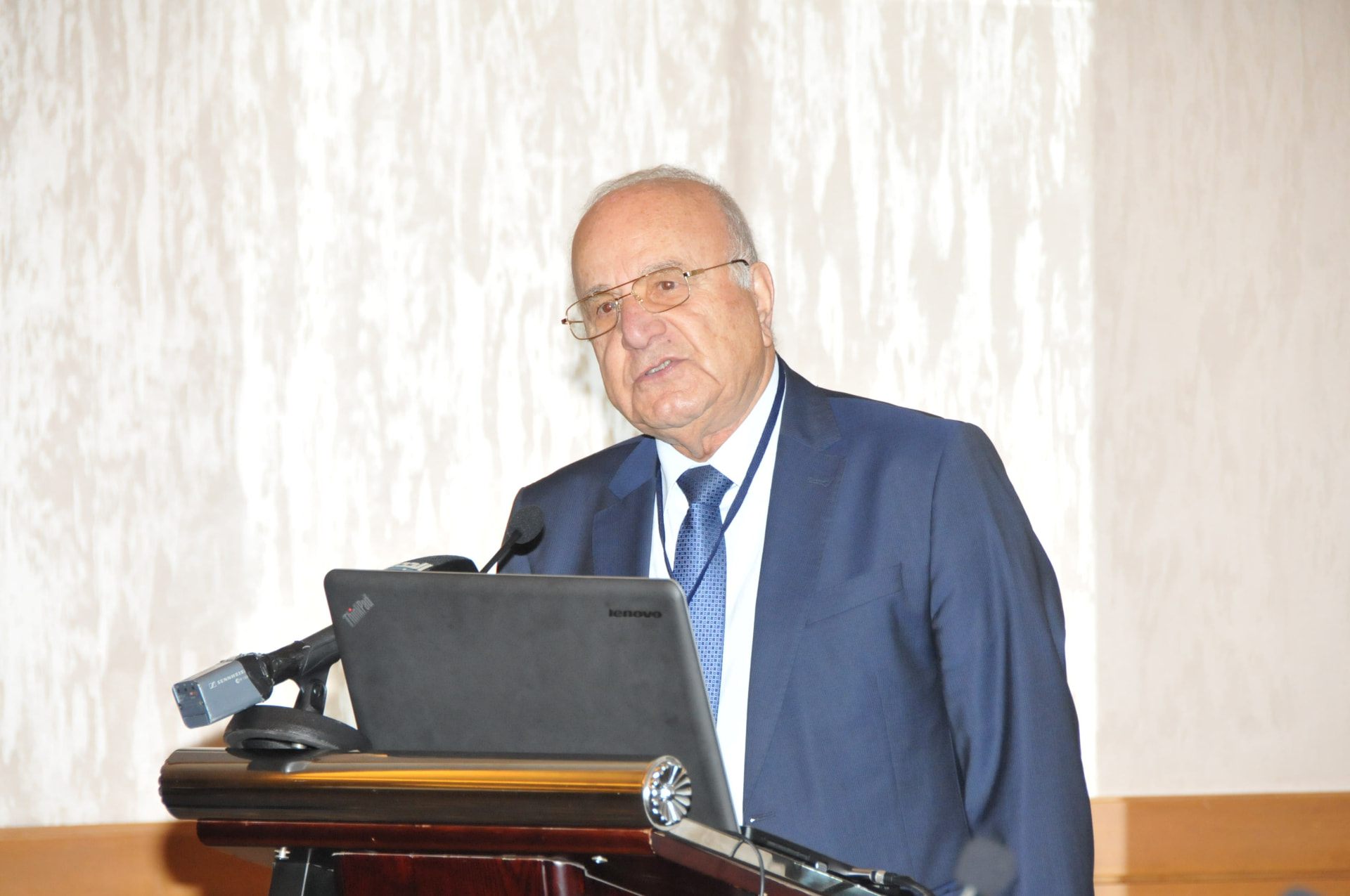 Speaker at the conference lectern