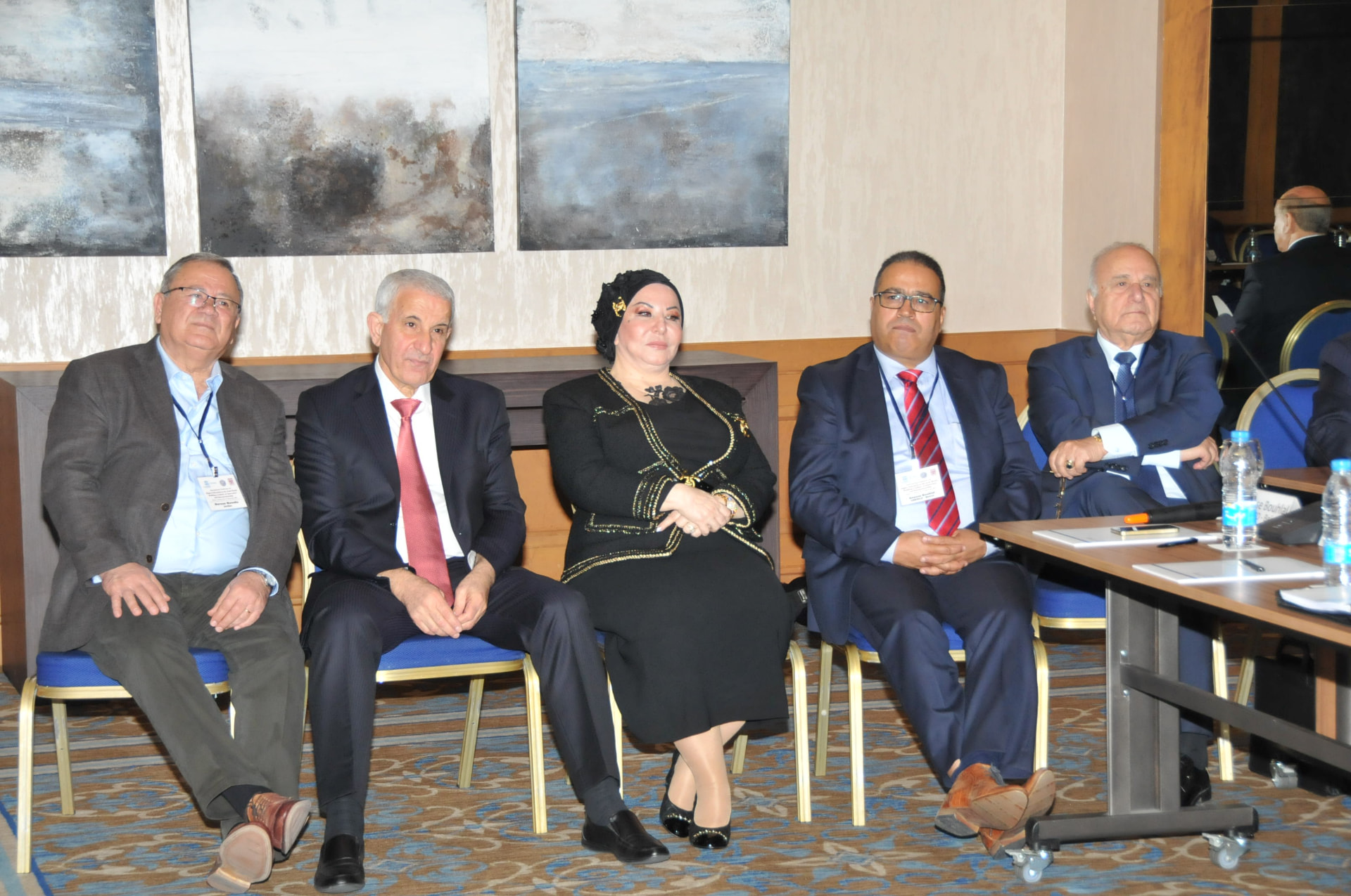 Conference panel and delegates
